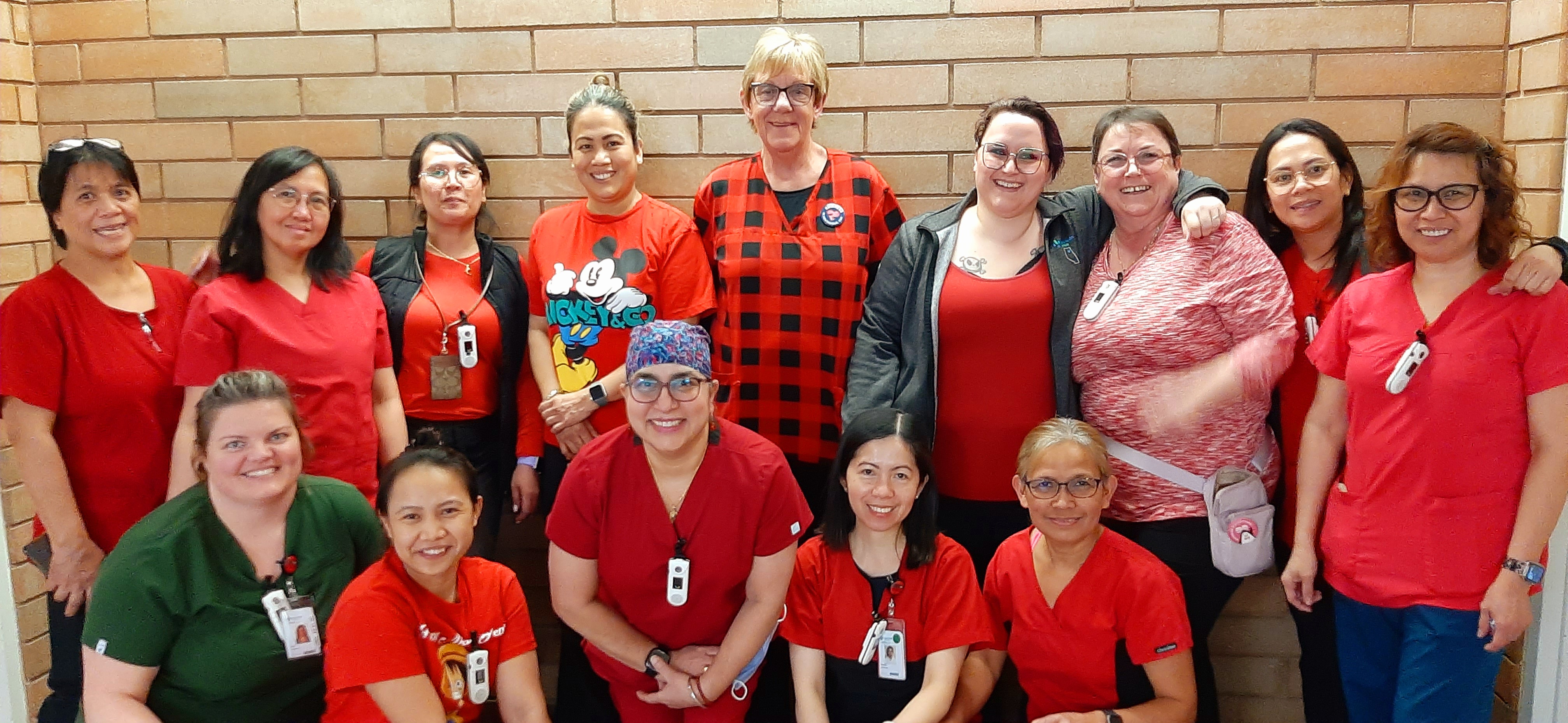 Members of Northern Lights Health Centre wearing red