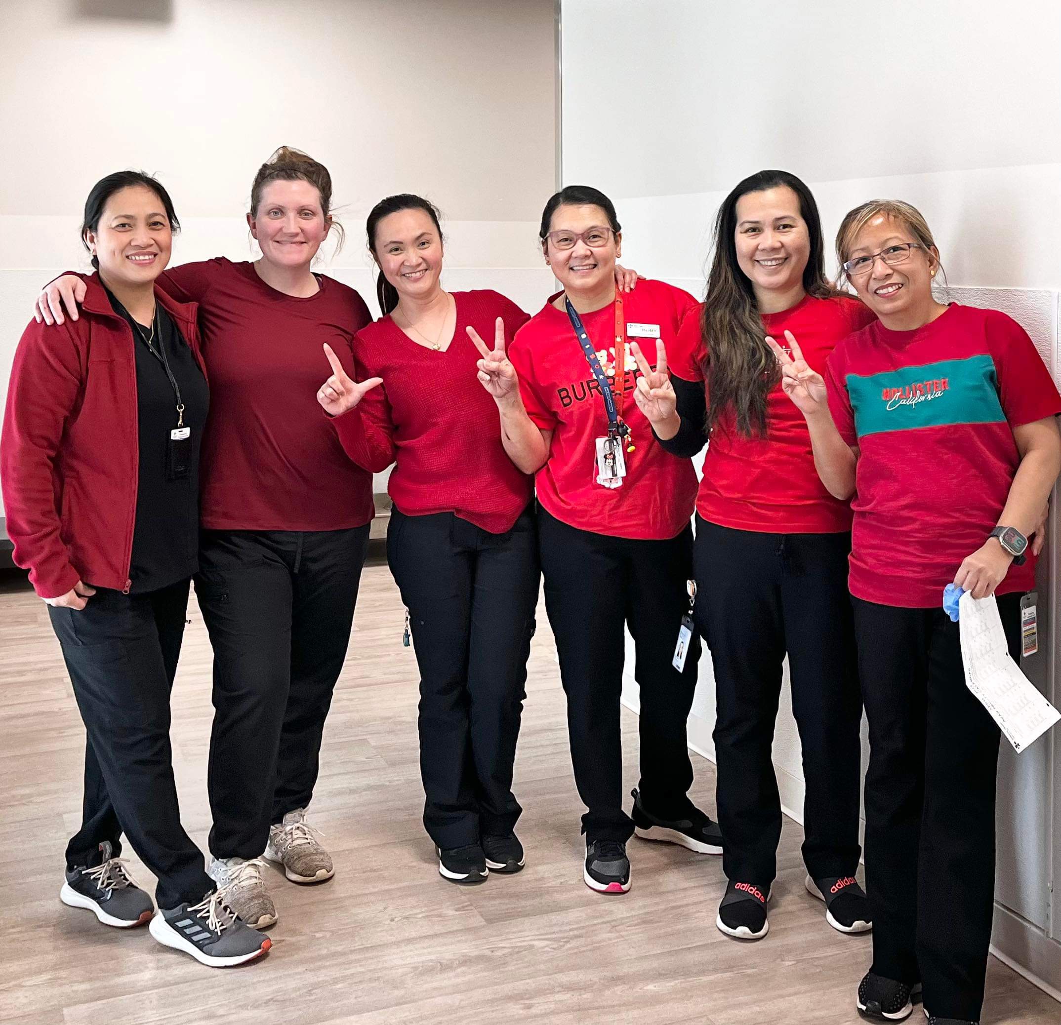 Members at Willow Square Community Care wearing red