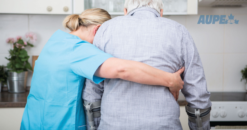 health-care worker supports senior