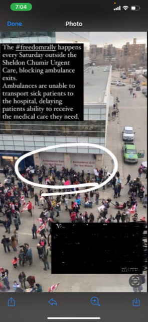 Protesters in front of the amblulance bay at the Sheldon M. Chumir Health Centre